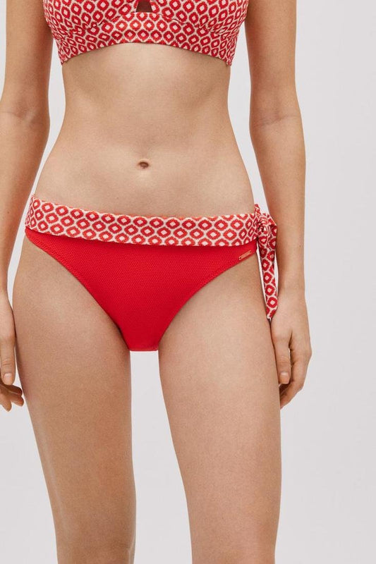 Braga de bikini talle medio con lazo lateral estampado naranja COMBINABLE YSABEL MORA