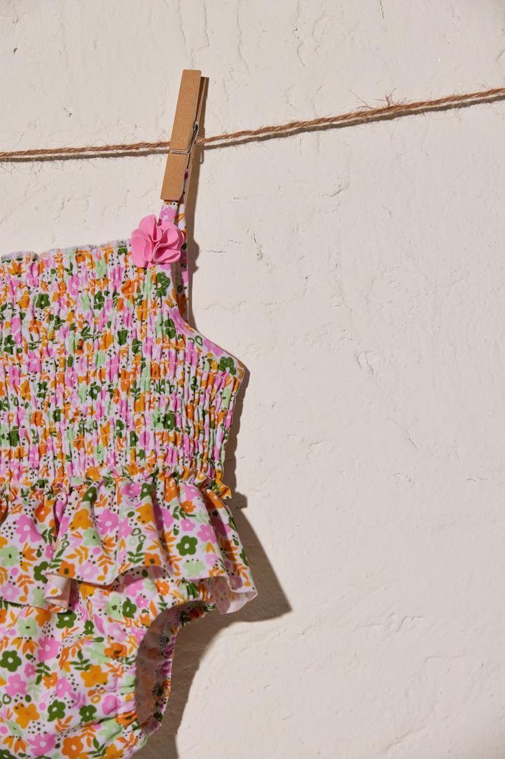 Bañador bebé niña volantes y flores pequeñas YSABEL MORA