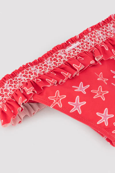 Bikini niña detalles volantes y nido de abeja estampado estrellas marinas Ysabel Mora