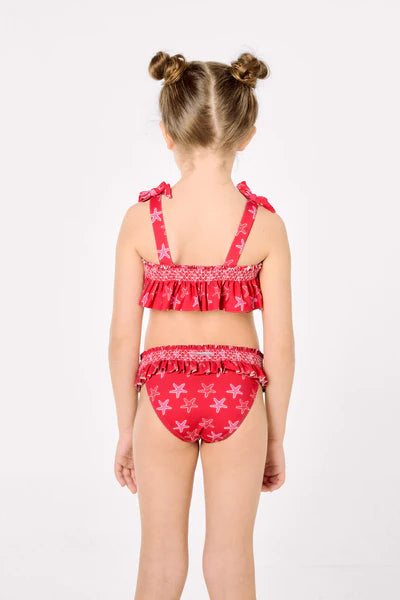 Bikini niña detalles volantes y nido de abeja estampado estrellas marinas Ysabel Mora