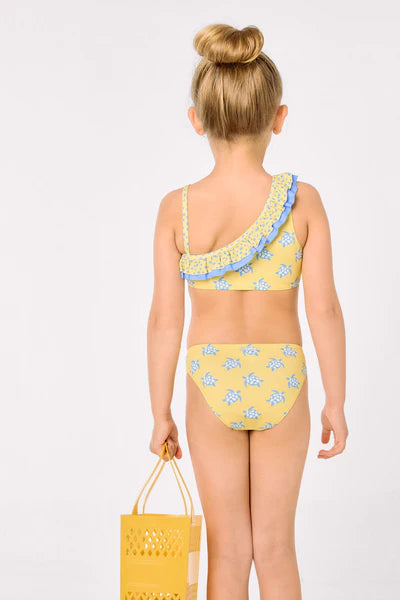 Bikini niña asimétrico detalle volantes estampado tortugas Ysabel Mora