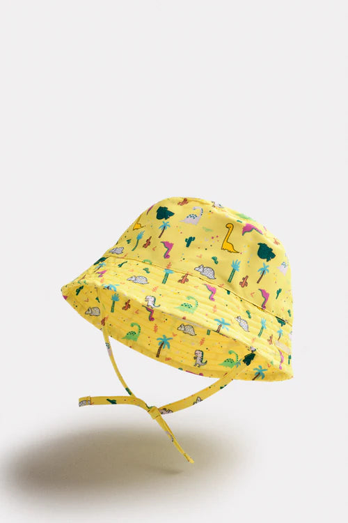 Gorro de playa bebé ala recta estampado dinosaurios Ysabel Mora