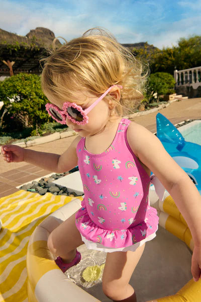 Bañador bebé niña detalles volantes y lazos estampado unicornios Ysabel Mora
